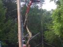 Tim K8IAT cutting away wire-ty's to allow the beam to turn