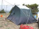 The wind took over and began destroying the tent.  Notice the bottom seam beginning to tear.
