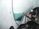 The wind caused the tent to encroach on my operating space.  This was after I put up a tarp over the hole in the tent.