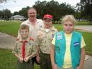 Tony N2MFT stands with Ian (no call yet) and Reid KI4MLR of Troop 61 Valrico FL and Ella with GSA Troop 930 also from Valrico FL.