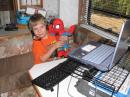 Scotty working on the 40m station. Yes, he actually made some contacts. And he was keeping Spiderman from playing with the antennas.
