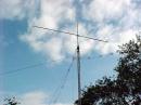 Crankup tower with 5 element 6m yagi and 5 band fan dipole below.
