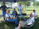 Fellowship at SSRC Field Day - WB9GIU, K4LSB, Master Burger Chef KQ4UJ, KI4UYM, and N4US enjoy a little shade.