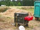 here is our trusty not so rusty ex military diesel generator runs 4 latops and 4 radios and lights with no problems