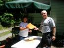 KC2OBS (Jane) handing information to a friend who had stopped by.