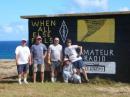 Bob - N0DQD, Wayne - WH6OR, Joe - AH6RQ, Bob - KH7FX and son Forrest in front of a WWII blockhouse on the beach at Hookipa Maui.