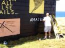 Bob decides to paint over the graffiti on the blockhouse.