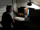 John working late on the CW station, oblivious to the shuffling footsteps approaching from the darkness...