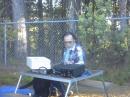 NI6Z working 20 meters. Note the use of the K9DOG tail generated power supply under the table. Ingenious !