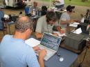 EC Joe Kendall, KE4JYC, logs for James Skala, KY4JLS on Saturday as Field Day operating begins.