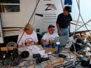 L - R: KX7YT, K7VIT &amp; KD7YCU try to figure out what happened to networked computer connections.