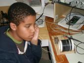 Student listening to a crystal radio.