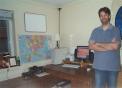 ARRL Contest Branch Manager Sean Kutzko, KX9X, at his Connecticut apartment QTH. The feedpoint for his indoor loop is at the top of the photo. Using QRP power and the indoor wire loop, he was still able to work 31 DXCC countries in the contest.