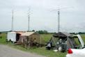 The setup at VE3WCC, with (left to right) operating trailer, 10 GHz station tent, and galley tent.  Towers and antennas are in the background.