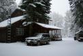 N7PR "CABIN" AT 5000 FEET DURING LIGHT SNOW STORM. OUR SIX HAM TOWERS AND SOLAR PANEL ARRAY ARE NOT SHOWN IN THIS PICTURE