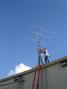 KD5MML and AD5JT mount the yagis for the VHF station <i>photo by KE5QZQ</i>