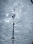 Re aligning the six meter antennas. One of the TIC Rings got out of sync, and K1WHS is up there persuading it to aim itself in the right direction. The six meter antenna is 4 X 7 element yagis stacked vertically.