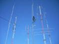 The 192' tower to the left is the J-poles for 40 and 80 meters.  The 15 and 20 Meter tribanders are in the ruckus somewhere!