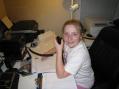 9 year old Kaitlyn Cole KJ4GPG passes out another contact during the 2008 November Sweepstakes.