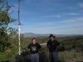 Left to right from atop Signal Peak, near John Wayne Airport, CA (DM13co): Tom, KI6GOA's stack of KU4B two meter loops; Pete, N6ZE; and Tom, KI6GOA/6. N6ZE/R briefly visited KI6GOA's QRP Portable Station operation on Sunday afternoon. 75 mile visibility prevailed &amp; poor tropo conditions prevailed also! (Les Wiley photo) 