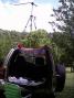 Operating location w/ camera tripod on roof. Wire dipole is about 10 feet. Red towel is weak attemp at a sunshade!