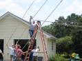 Photo 1 shows Brian Shepard Sr., KJ4DHB attaching the A3S to the mast.  I think he is mumbling, "how did I get picked for this job?"