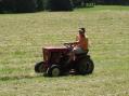 Ed, W8EDB, mowing the field.  This is where it starts.
