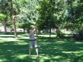Rick Hess, kc0nzw, using his bow and arrow to get fishing line up high in the trees.