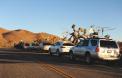 Seven rover stations line up for a photo opportunity in Joshua Tree National Park, with the bizarre shapes of the
trees competing with toolbox stations for visual drama. This photo was taken in the rare grid of DM23 just before the end of the contest. N6VI's 4Runner is in the foreground at right.