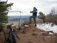 Operating from the summit of Mt Herman, with the FT-817 and a whip antenna. Note the tilting of the whip antenna to optimize the antenna polarization. I was able to work both vertically and horizontally polarized stations by just tilting the radio for maximum signal.
