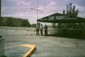The three of us next to the 3 element Yagi on a push up pole attached to the Car Wash canopy on the roof of the parking gargage at about 60 feet.