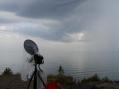 A small squall line with light rain crosses the NLRS Eagle Harbor, MI operating site.  The dish is looking west (314 km)  toward the Minnesota side of Lake Superior.