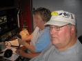 Jim, K5BZH, and Carol, WD5DCZ, in their garage hamshack in Amarillo.