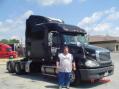 Me with my company truck.  HF mobile operating is a lot of fun with this much time behind the wheel.