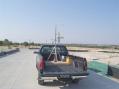 The portable 10 GHz antenna mounted on a rotor in the back of my truck.