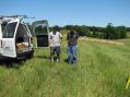 Jim, KC8JPZ (gray shirt) and myself (black shirt) getting ready to set up at W8GTS's farm, EM89.