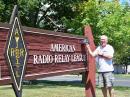 The author with his Yaesu hat in front of the ARRL HQ sign.