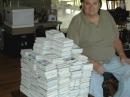 Steve, WØSJS, with a stack of about 18,000 cards arriving at the bureau.