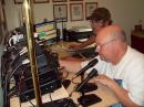 These two hams are having a lot of fun making QSOs from WB3IGR in Easton, Maryland during the 2010 ARRL June VHF QSO Party. [George Fazio, WB3IGR, Photo]