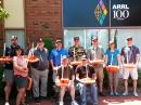 Students at the Advanced Teachers Institute class at ARRL Headquarters display their marine buoys, used to teach data collection. [Debra Johnson, K1DMJ, photo]