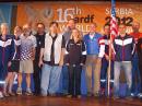 Twelve of the members of USA’s delegation to the 16th ARDF World Championships. Left to right are Ruth Bromer, WB4QZG; Lori Huberman; Joseph Huberman, K5JGH; Nicolai Mejevoi; William Smathers, KG6HXX; Scott Moore, KF6IKO; Alla Mezhevaya; Jay Hennigan, WB6RDV; George Neal, KF6YKN; Vadim Afonkin, KB1RLK; Harley Leach, KI7XF, and Karla Leach, KC7BLA. Not shown are Bob Cooley, KF6VSE, and Marvin Johnston, KE6HTS, who was a member of the international jury. [Jay Hennigan, WB6RDV, photo]