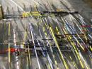 These 2 meter ARDF sets are awaiting competitors at the equipment impound area of the 2008 World Championships. Almost all of them feature Yagi directional antennas made from springy steel tape. [Ken Harker, WM5R, Photo]