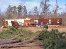 The EF2 tornado damaged this residence on the northwest side of Fordyce. [Photo courtesy of the Little Rock NWS office]