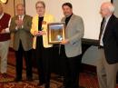 In recognition of his nearly 30 years in volunteer service to the League, the ARRL Board of Directors honored outgoing ARRL President Joel Harrison, W5ZN, with a plaque presented by (left to right) International Affairs Vice President Rod Stafford, W6ROD; Vice President Rick Roderick, K5UR; First Vice President Kay Craigie, N3KN; President Joel Harrison, W5ZN, and Chief Executive Officer David Sumner, K1ZZ. [Steve Ford, WB8IMY, Photo]