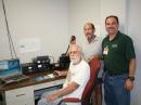 WX4NHC Coordinator John McHugh, K4AG (seated), Dr Dale Botwin, KR4OR, and WX4NHC Assistant Coordinator Julio Ripoll, WD4R, helped to coordinated the Amateur Radio communications support in Haiti for Project Medishare.
