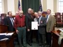 Amateur Radio operators in Maine receive recognition from their state legislature. Shown (from left to right) are Bill Crowley, K1NIT; Ivan Lazure, N1OXA; Rod Scribner, KA1RFD; House Speaker Robert Nutting; Jack Schrader, W1JHS; ARRL Maine Section Manager Bill Woodhead, N1KAT, and State Representative Tom Winsor, KA1LUN. Also attending were Carolyn Naiman, N1LVR (House Clerk), Bob Howe, K1LTO, and Bill Mann, W1KX. 