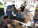 Will Stewart, getting coached on how to make QSOs. [Sterling Coffey, N0SSC, Photo]