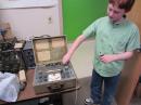 Jacob shows me his ancient -- and working -- Heathkit vacuum tube tester. [Sterling Coffey, N0SSC, Photo]