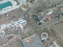 Roofs were blown off and some buildings were leveled in Windsor by a tornado on May 22. [Photo courtesy of The Denver Post]