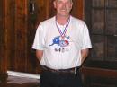 Jerry Boyd, WB8WFK, proudly wears his 2 meter gold medal for M50 category. [Joe Moell, K0OV, Photo]